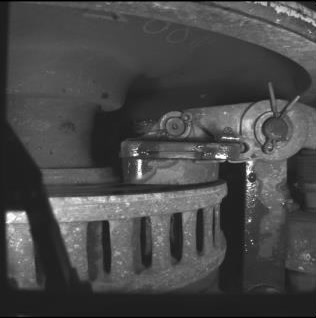 The unannotated original brake pad image, from the first panel of the report.